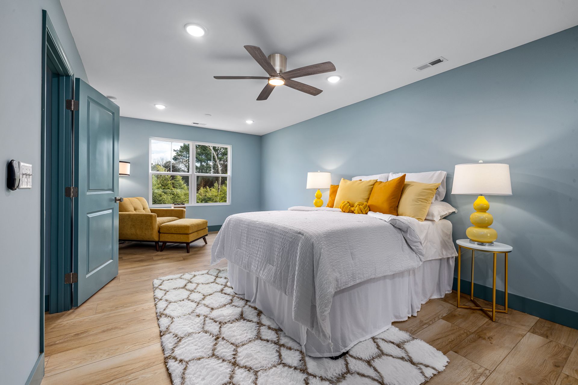 Modern bedroom interior with ceiling fan