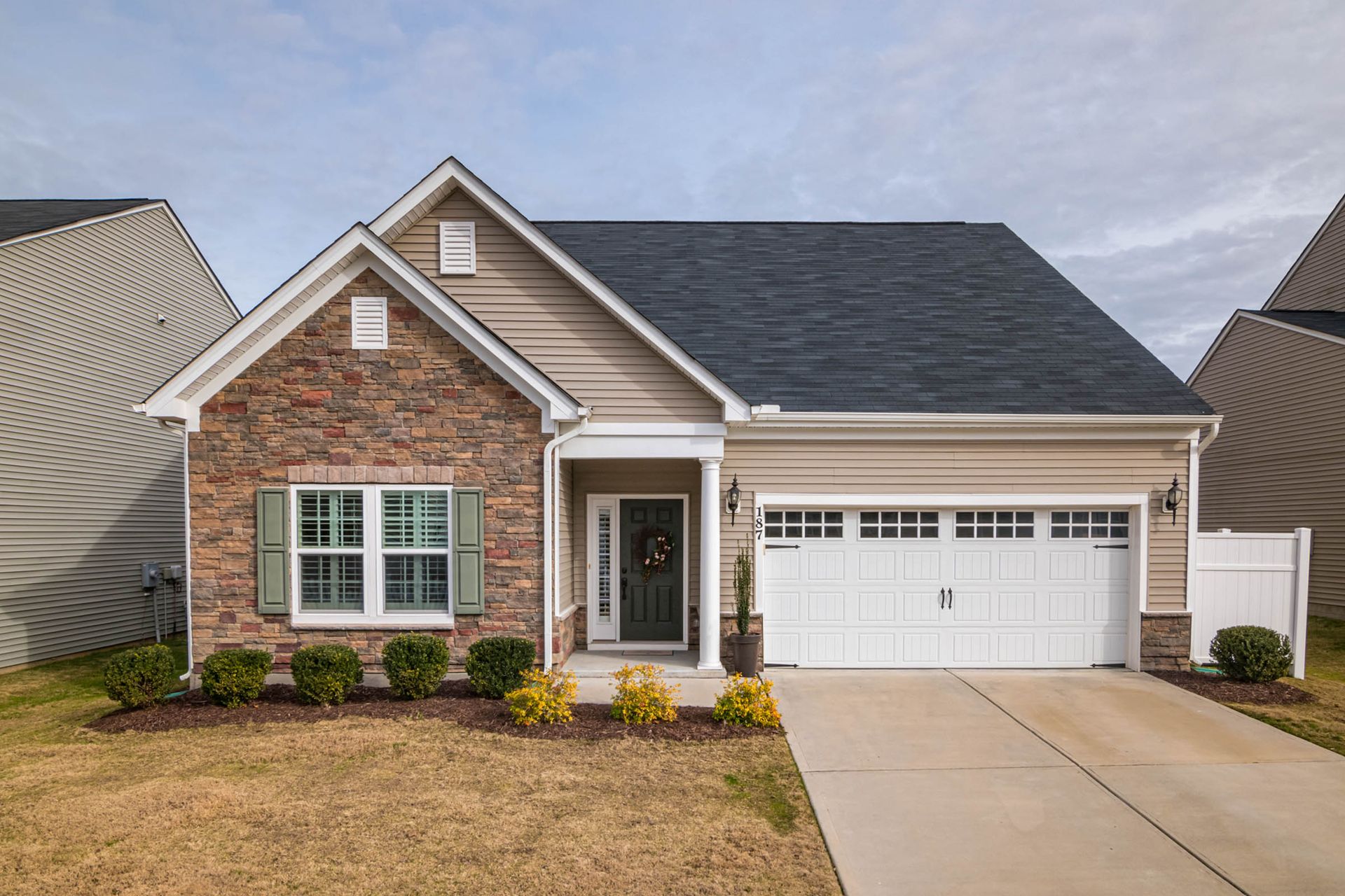 Suburban house exterior showing roof and gutters